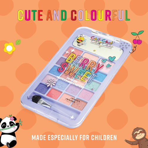 Children's makeup set with 'Berry Sweet' text on an orange polka dot background