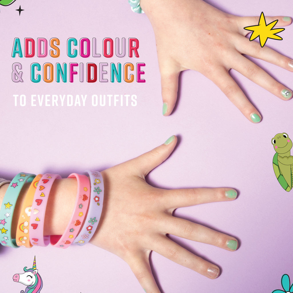 Hands wearing colorful bracelets with text 'Adds colour & confidence to everyday outfits' on a pink background.